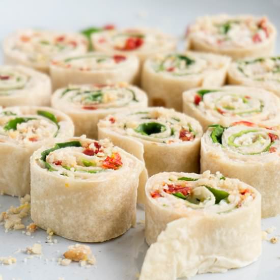 Sun-Dried Tomato + Basil Pinwheels - Recipe photo by ebrees