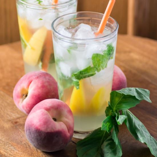Refreshing Peach Basil Cocktail - Recipe photo by noshingwiththenolands