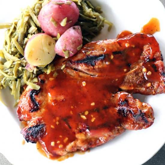 Honey Bourbon Pork Steaks - Recipe photo by Buy This Cook That