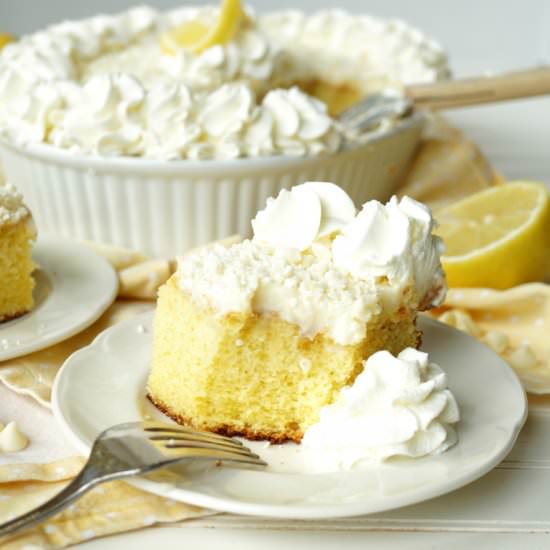 Lemon White Chocolate Poke Cake - Recipe photo by thebakingfairy