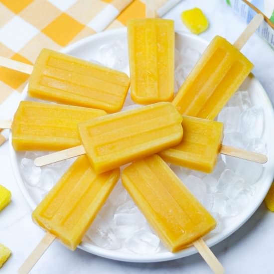 Orange Mango Popsicles - Recipe photo by Zest and Lemons