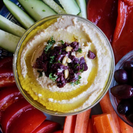 Hummus with Olives and Pine Nuts - Recipe photo by healthyharvest