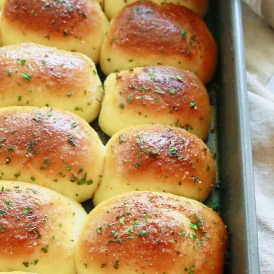 Cheesy, Garlicky Parker House Rolls - Recipe photo by kitchenathoskins