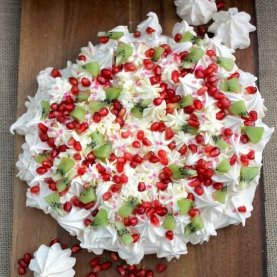 Pomegranate and kiwi crown pavlova - Recipe photo by bakingqueen74