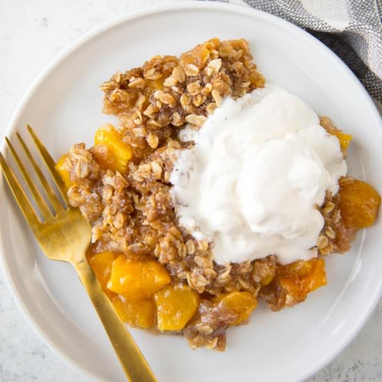Slow Cooker Peach Cobbler - Recipe photo by slowcookergourmet