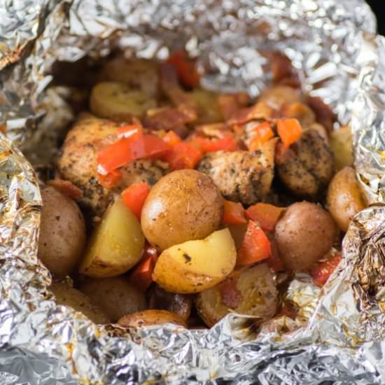 Grilled Chicken Potato Foil Packs - Recipe photo by noshingwiththenolands