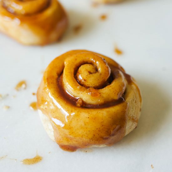Bananas Foster Cinnamon Rolls - Recipe photo by thewoodandspoon