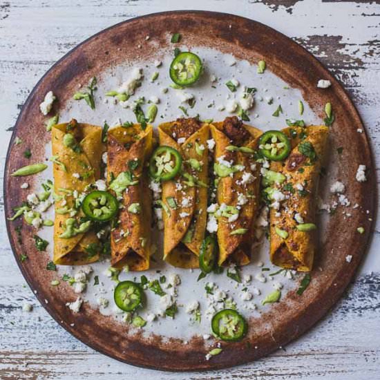 Taquitos with Avocado Crema Sauce - Recipe photo by atastymess