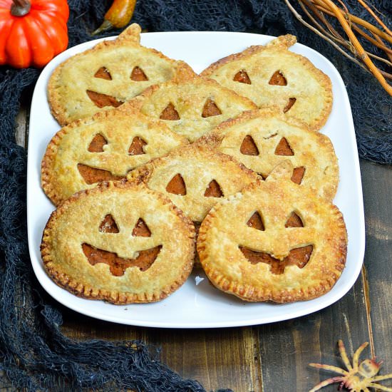 Haunted Pumpkin Hand Pies - Recipe photo by IAteTheWholeThing