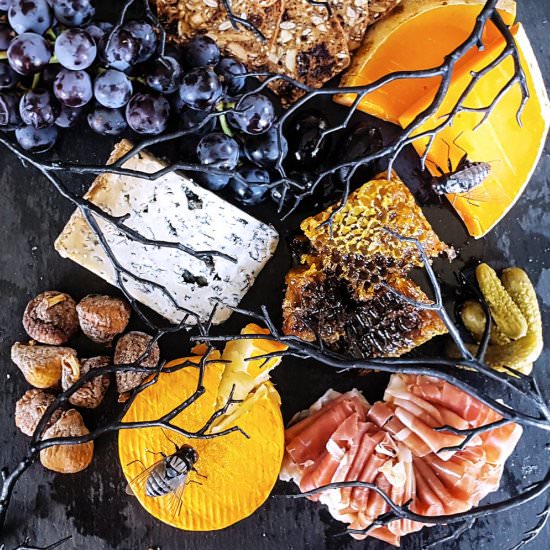 A Creepy Halloween Cheese Board - Recipe photo by FeastInThyme