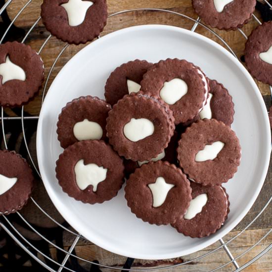 Spooky Chocolate Linzer Cookies - Recipe photo by nourishandfete