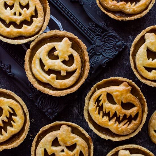 Jack-O-Lantern Pumpkin Pies - Recipe photo by Domestic Gothess
