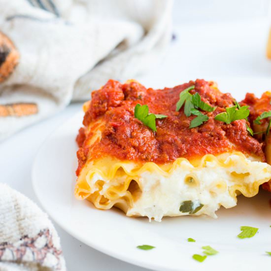 Cheesy Lasagna Roll Ups - Recipe photo by No Plate Like Home