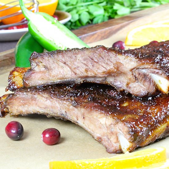 Sticky Cranberry Orange Glazed Pork Ribs - Recipe photo by In Good Flavor