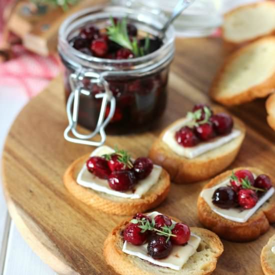 Festive Crostini Brie Topper - Recipe photo by SatoriDesignForLiving