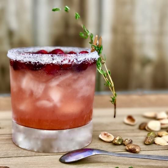 Cranberry-Orange Whisky Sour - Recipe photo by simmerandsauce