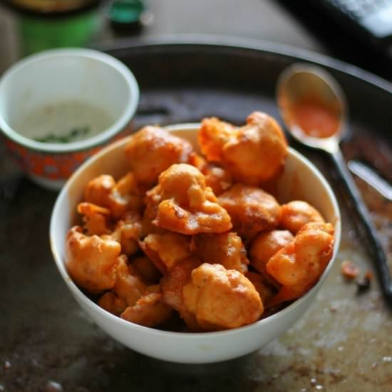 VEGAN BUFFALO CAULIFLOWER BITES - Recipe photo by VeganWithCurves
