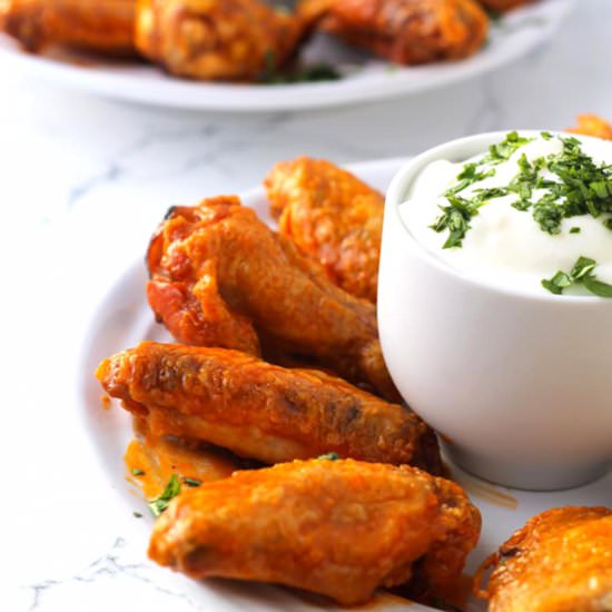 Crispy Baked Hot Wings {Paleo} - Recipe photo by TheNourishedFamily