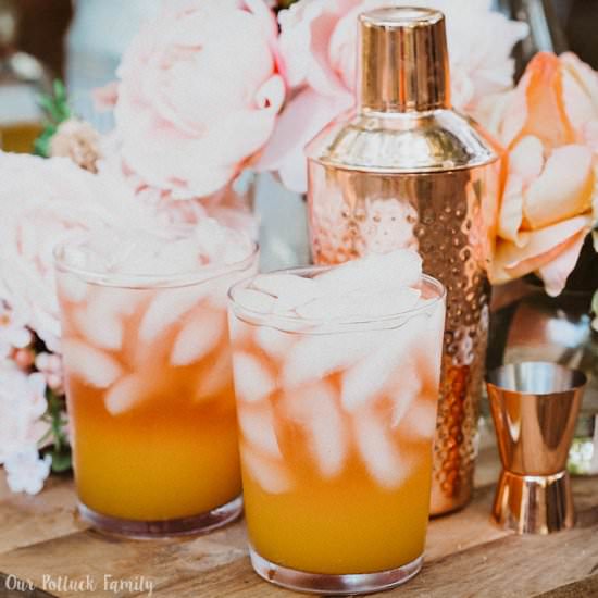 Peach Mango Sparkling Rosé Cocktail - Recipe photo by OurPotluckFamily