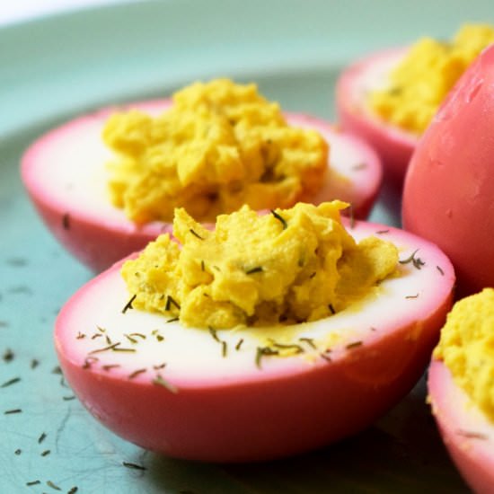 Pink Deviled Eggs - Recipe photo by nibblesandbits