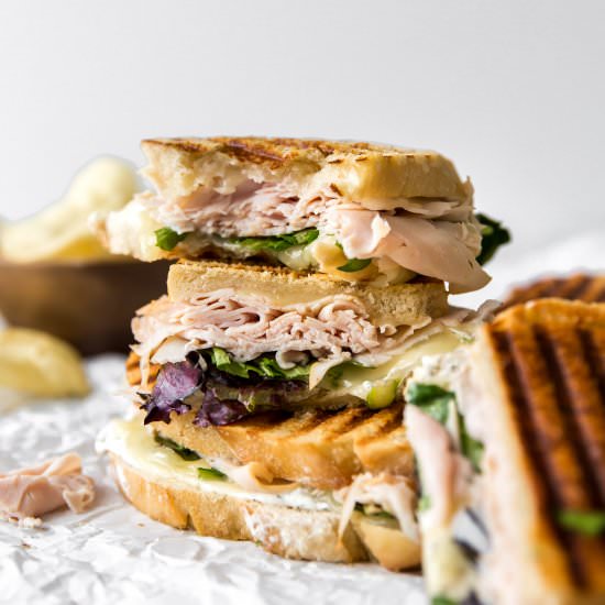 Cheesy Turkey & Dill Paninis - Recipe photo by kjandcompany