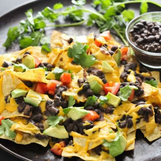 VEGAN BLACK BEAN NACHOS - Recipe photo by VeganWithCurves