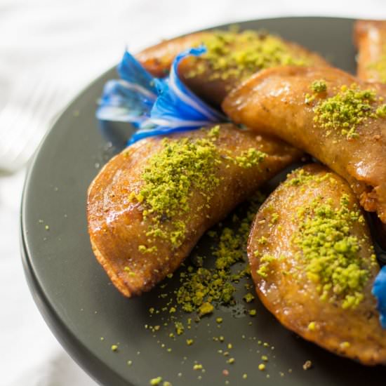 Walnut stuffed Atayef - Recipe photo by SimplyLebanese