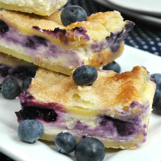 Sopapilla Blueberry Cheesecake Bars - Recipe photo by tuxedocatsandcoffee
