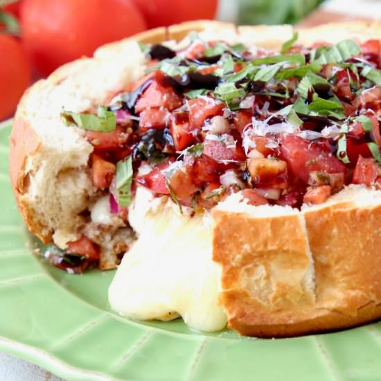 Bruschetta Baked Brie Bread Bowl - Recipe photo by Whitney Bond