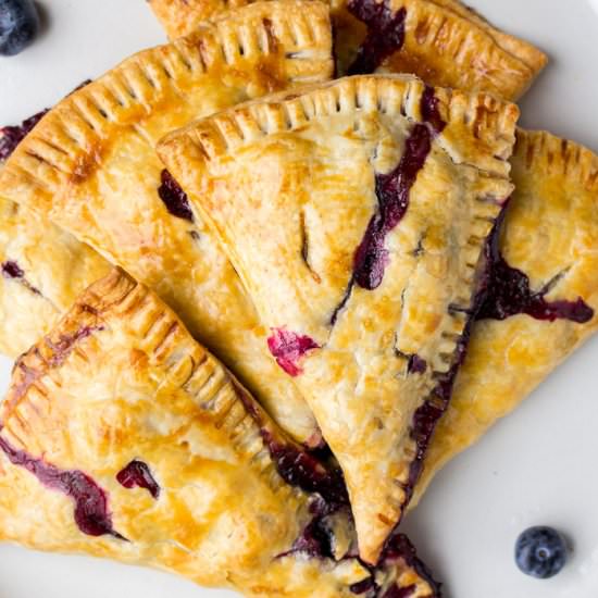 Rustic Lemon Blueberry Hand Pies - Recipe photo by Delicious Little Bites