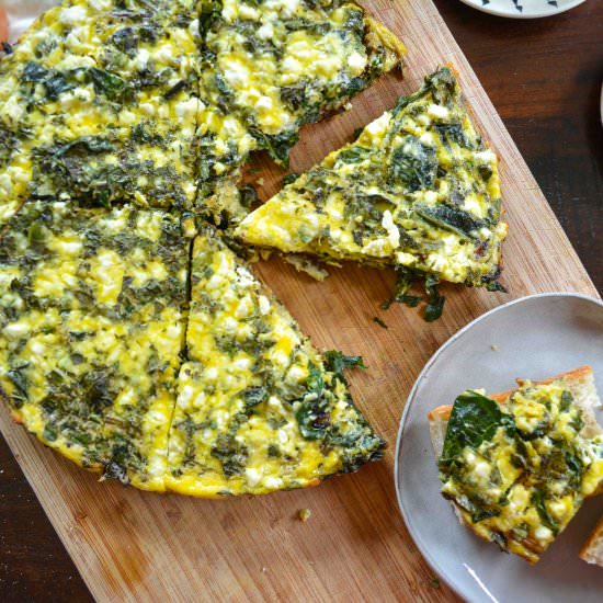 Baked Eggs w/ Garden Greens & Herbs - Recipe photo by Wanderings in my Kitchen