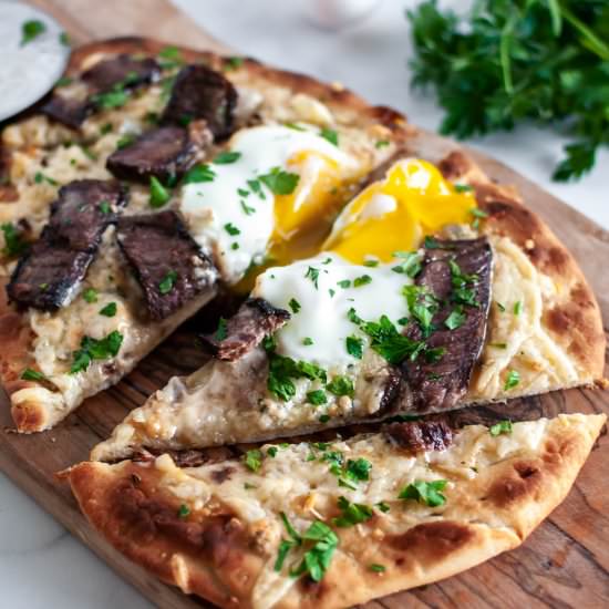 Steak and Egg Flatbread Pizza - Recipe photo by megseverydayindulgence