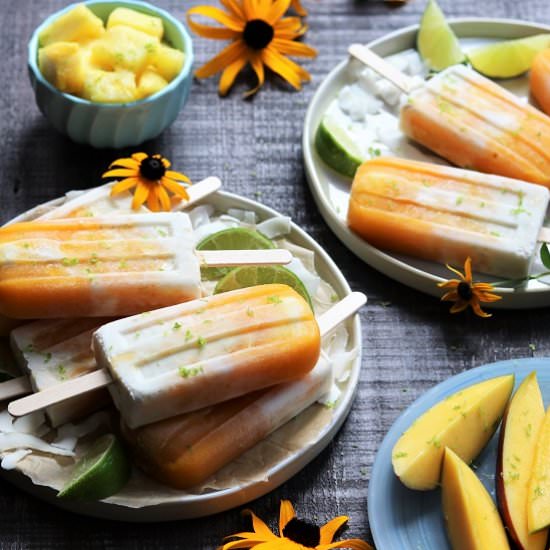 Mango Pineapple Coconut Popsicles - Recipe photo by Give it Some Thyme