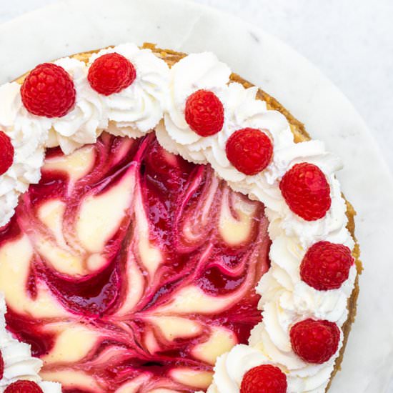 Raspberry Swirl Lemon Cheesecake - Recipe photo by confessionsofabakingqueen