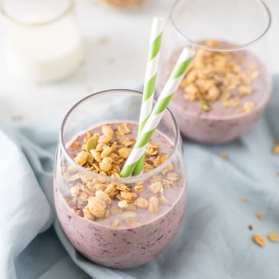 Triple Berry Smoothie with Granola - Recipe photo by Nourish Nutrition Co