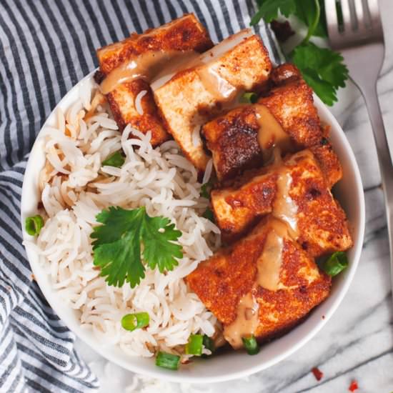 Crispy Tofu with Spicy Peanut Sauce - Recipe photo by cozypeachkitchen