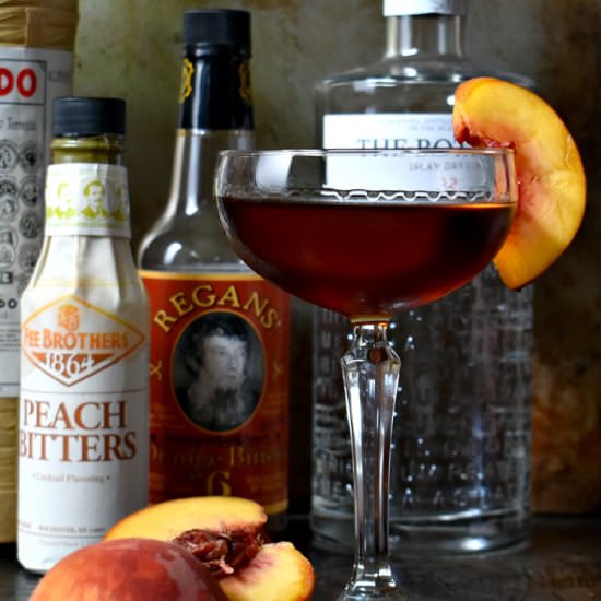 Peach Martinez Cocktail - Recipe photo by The Boozy Oyster