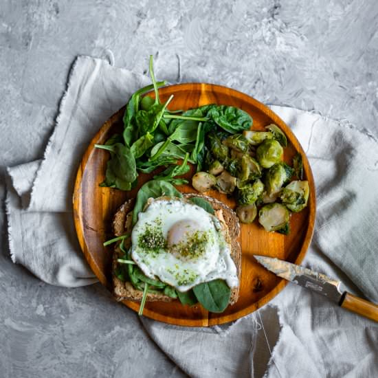 Hummus Egg Toast + Brussel Sprouts - Recipe photo by ashortgirlsfeast