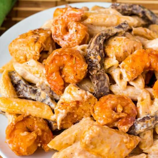 Shrimp Chicken and Steak Alfredo - Recipe photo by QueensleeAppetit