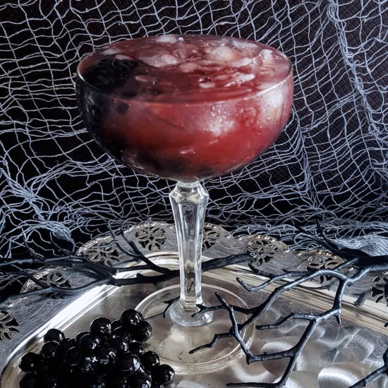 Earl Grey Bourbon Pomegranate Punch - Recipe photo by FeastInThyme