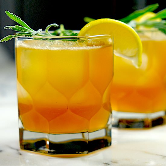 Lavender Elderflower Gold Rush - Recipe photo by SipsNibblesBites