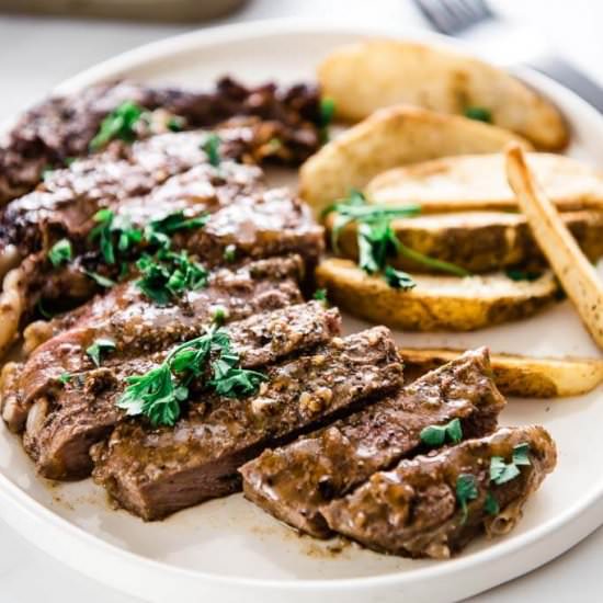 Skillet Steak with Pepper Gravy - Recipe photo by garnishedplate