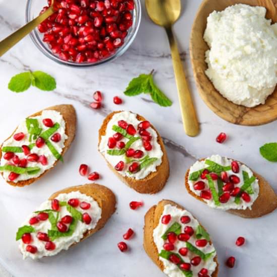 Pomegranate Crostini with Ricotta - Recipe photo by Tastefulventure