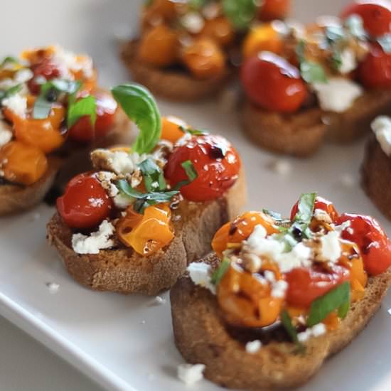 Cherry Tomato Goat Cheese Crostini - Recipe photo by finishedwithsalt