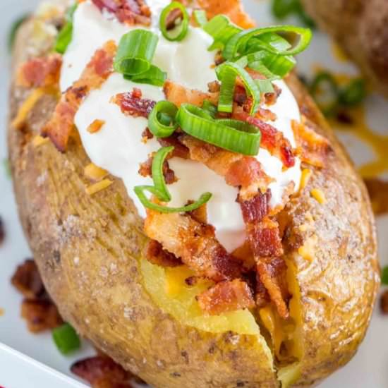 Perfect Oven Baked Potatoes - Recipe photo by peasandpeonies