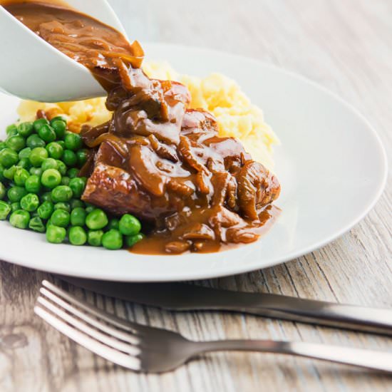Cumberland Sausage with Onion Gravy - Recipe photo by Brian Jones