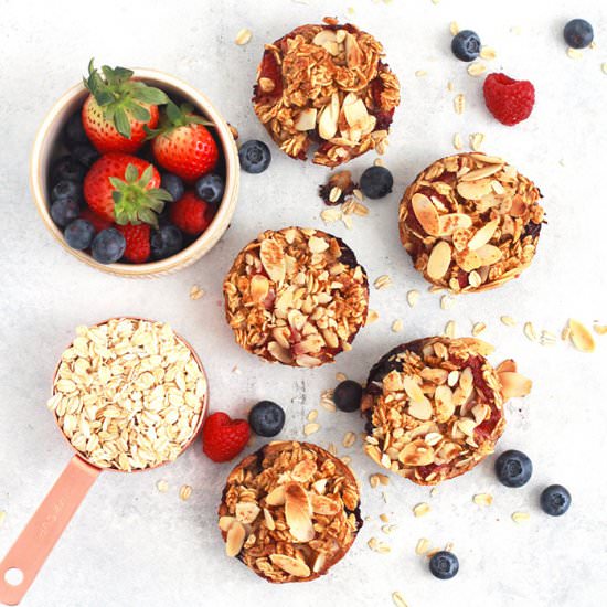 Baked Berry Oatmeal Cups - Recipe photo by FitLiving Eats
