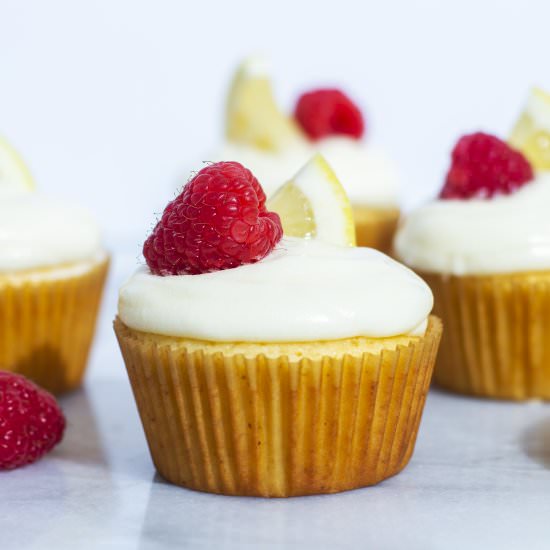 Raspberry Filled Lemon Cupcakes - Recipe photo by The Sugar Hub