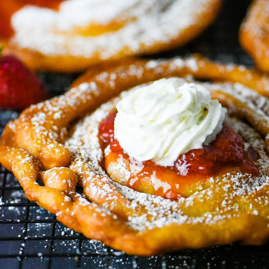 Funnel Cake with Strawberry Sauce - Recipe photo by dudethatcookz