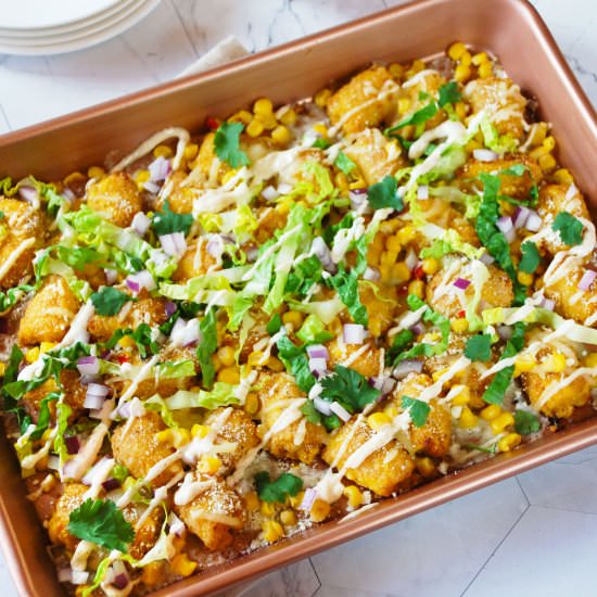 Mexican Street Corn Totchos - Recipe photo by mealsheelsandcocktails